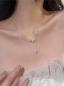 Preview: Elegante, minimalistische Halskette mit drei Herzquasten